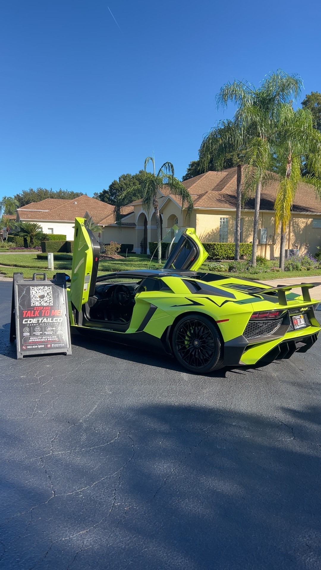 Lime-green Lamborghini Aventador SVJ with high-gloss paint and dressed wheels